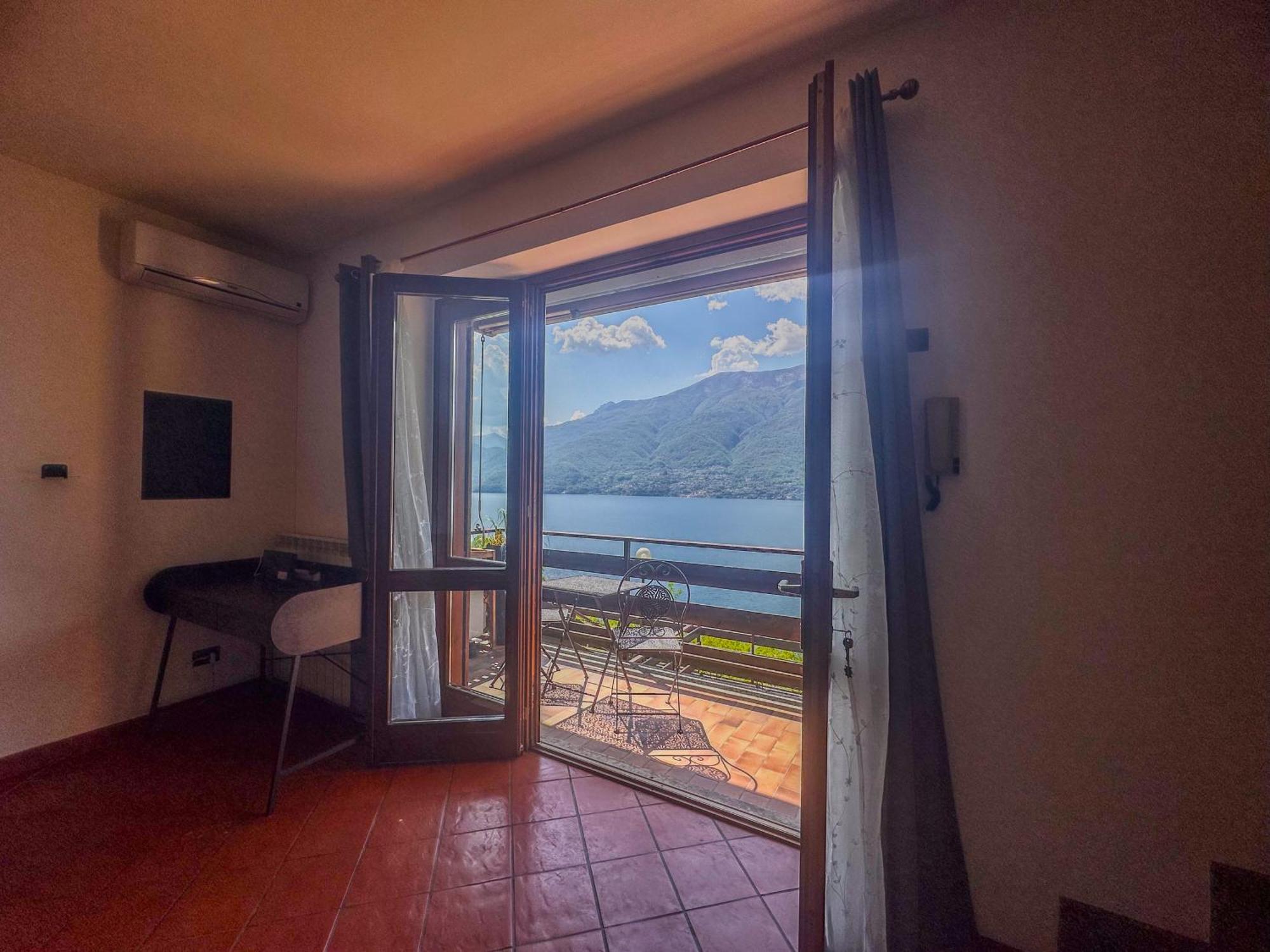 Appartamento A Due Passi Dal Lago Con Box Dorio Екстериор снимка
